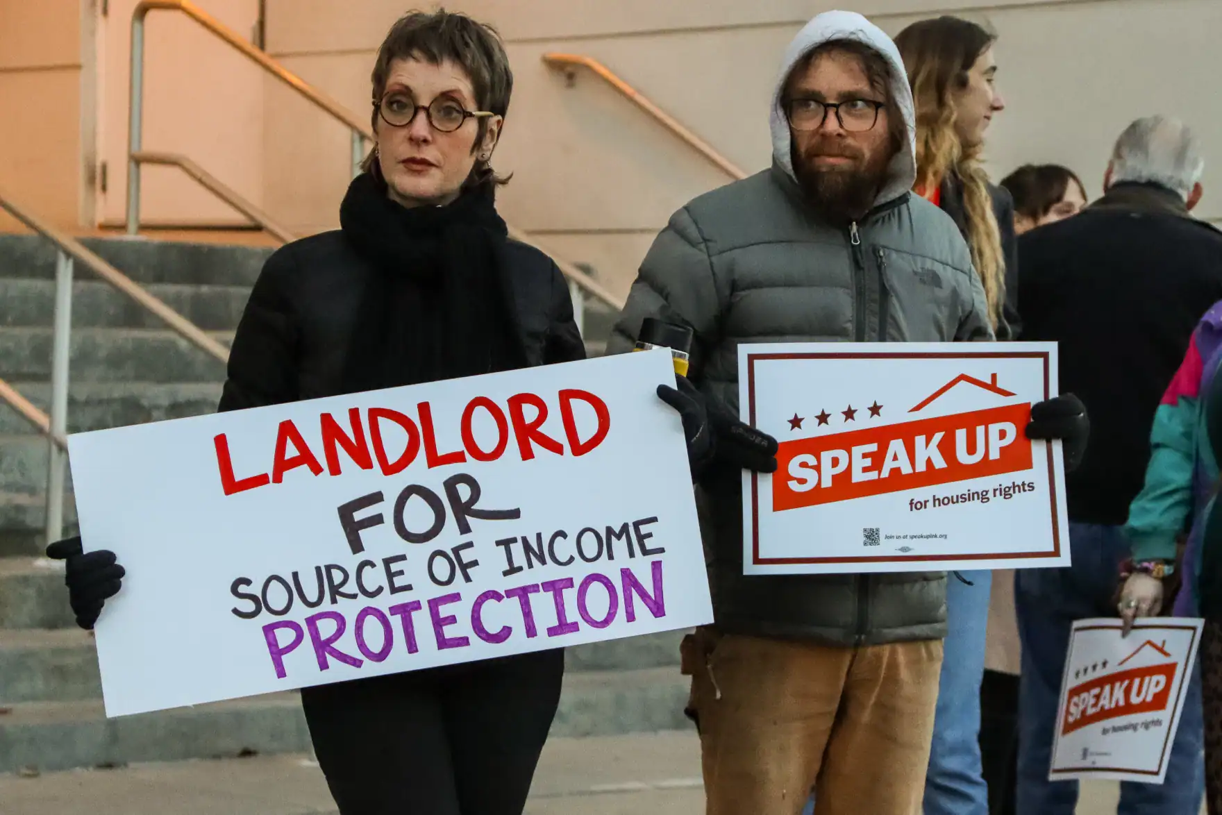 LANDLORD FOR SOURCE OF INCOME PROTECTION protest at housing rights rally in Lincoln, Midwest.