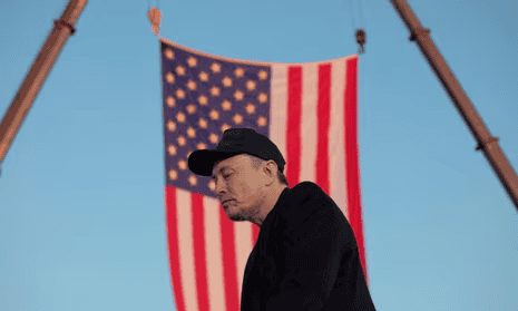 American flag hanging with a man in front, symbolizing themes of domestic violence and economic secu.