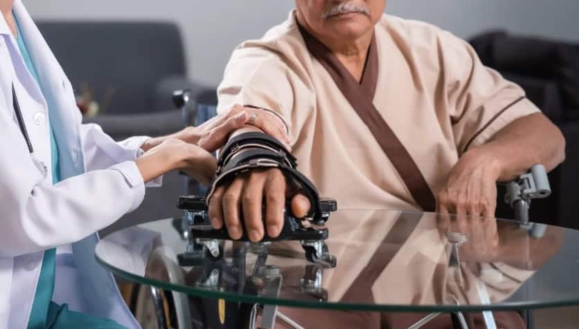 A patient undergoing a stroke assessment with a healthcare professional.