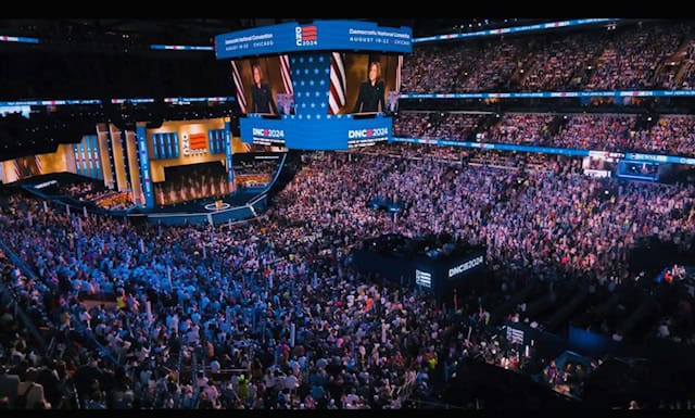 Large crowd at Chicago political rally during election night event.