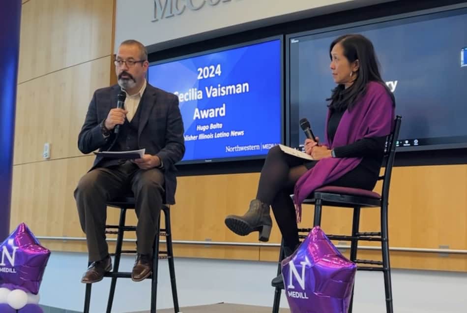 Hugo Balta receiving the 2024 Cecilia Vaisman Award for multimedia journalism at Latino News Network.