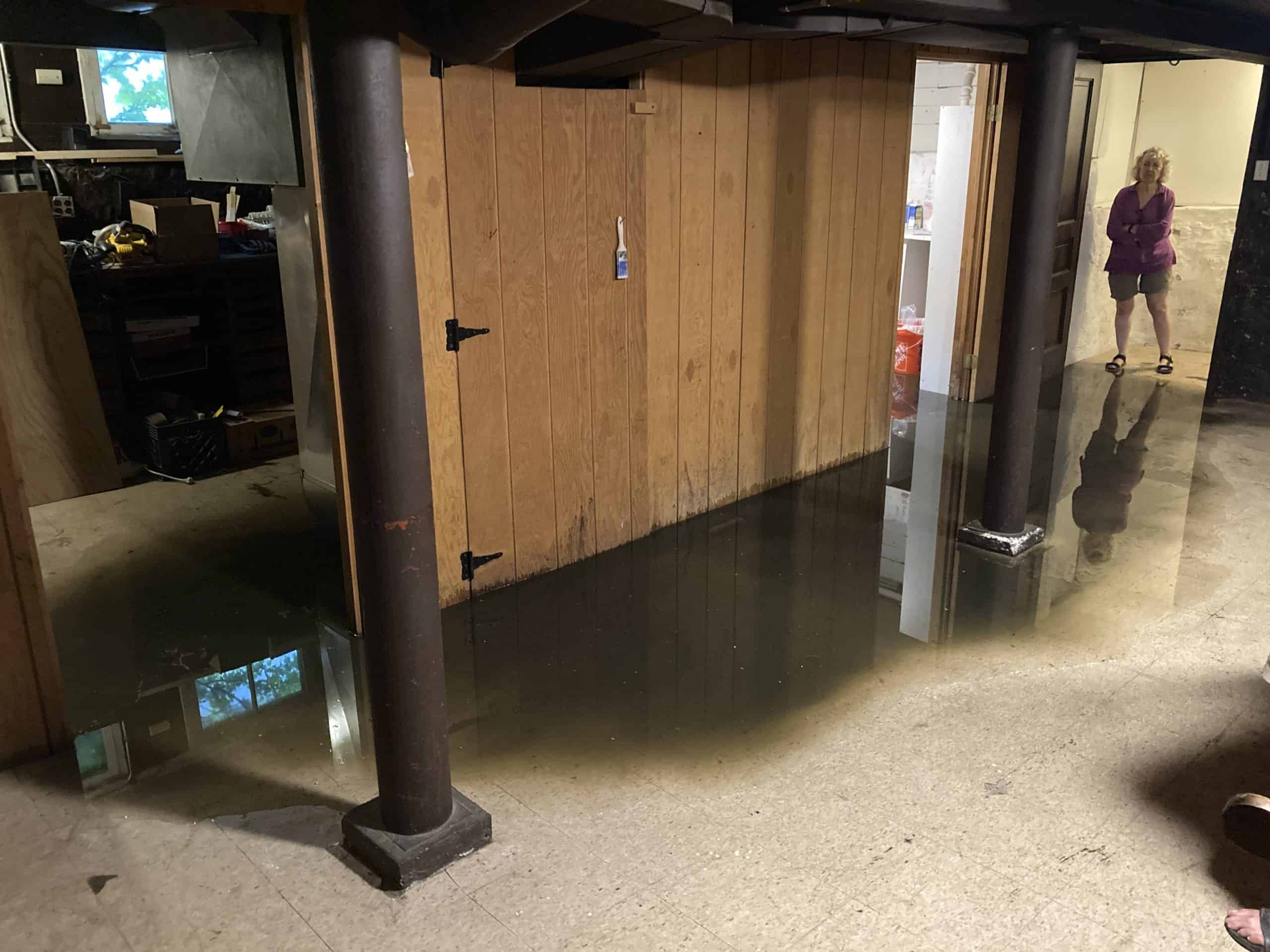 Flooded office space due to urban flooding in Illinois, causing damage and disruption.