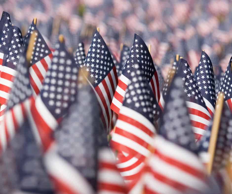 American flags at a patriotic event, symbolizing national pride and unity.