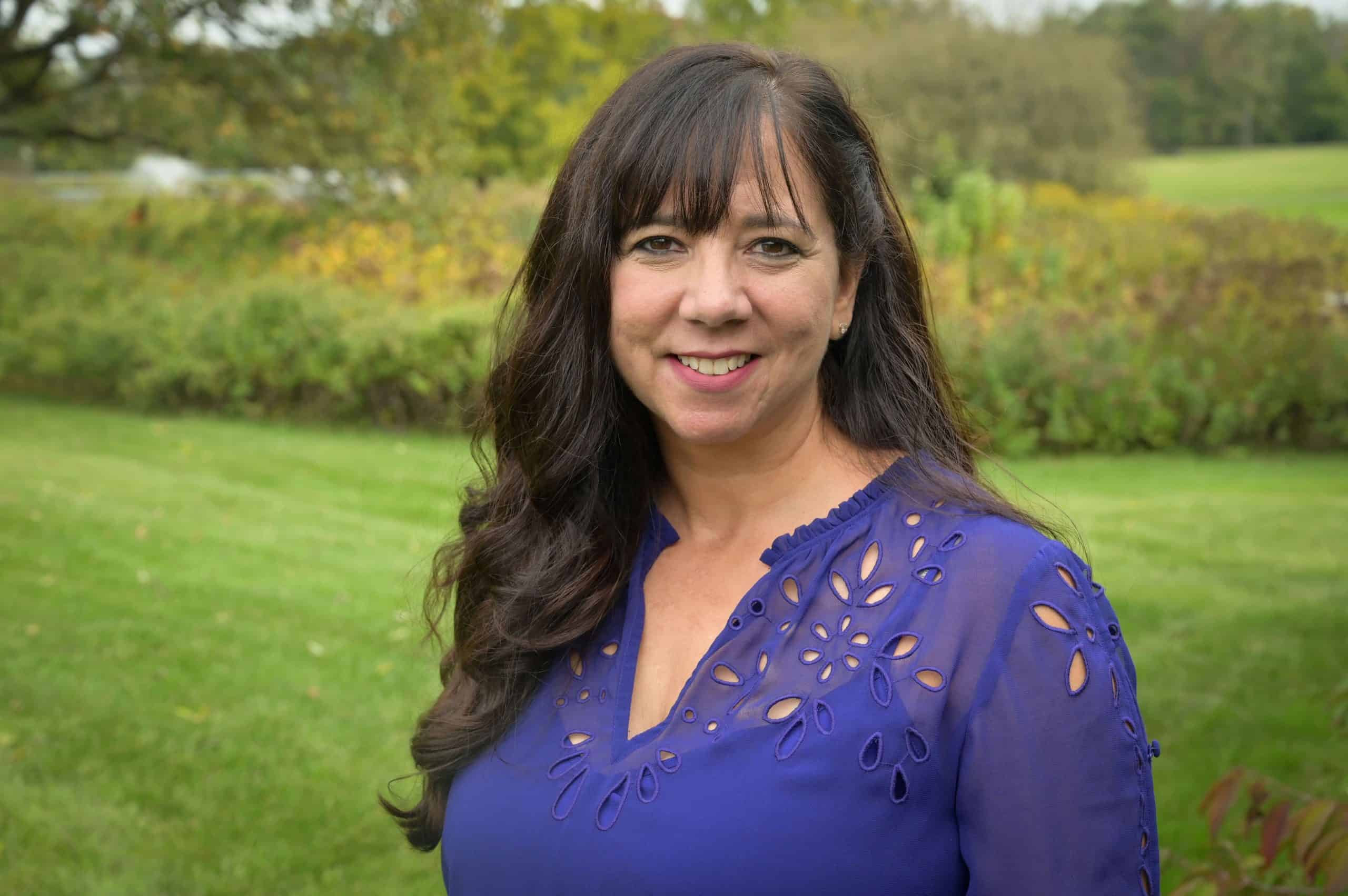 Elizabeth Aranda advocating for immigrant rights and higher education support in Florida.